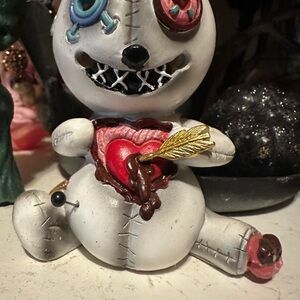 Unique Voodoo Doll Figurine with Heart Detail